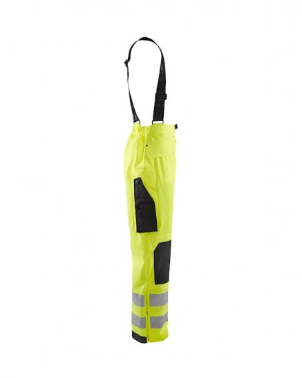 Blåkläder 13022003. En slitstark regnbyxa i varselfärger med stretchfunktion.